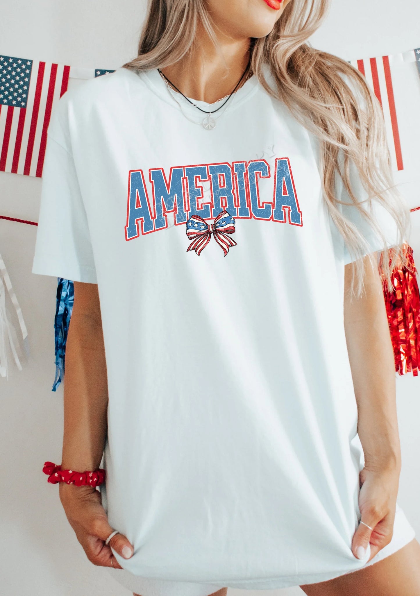 America Bow T-Shirt – Patriotic red, white, and blue graphic tee for 4th of July, Memorial Day, and Labor Day celebrations – LDC Designz USA pride shirt.