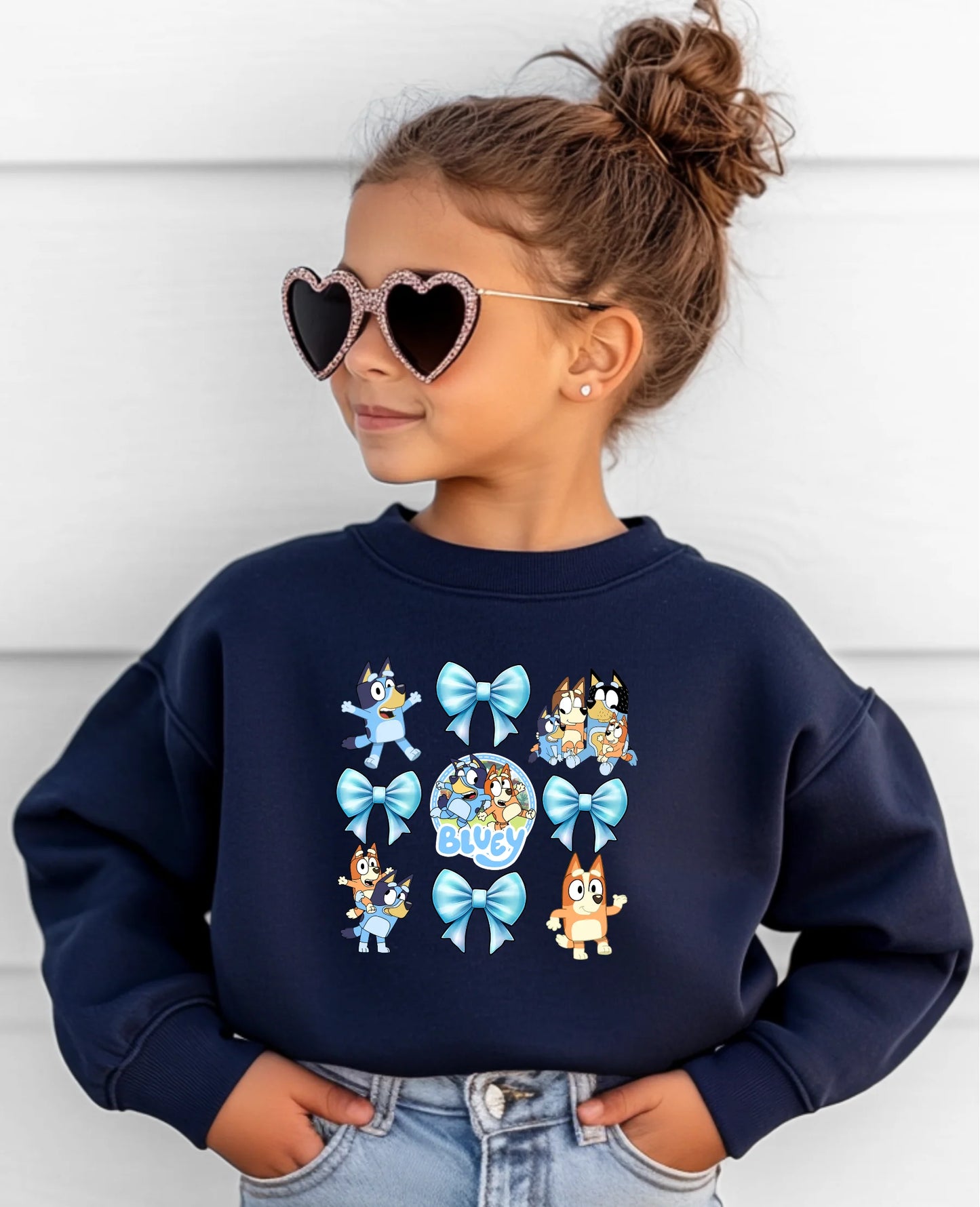 "Blue & Bows Youth Crewneck - soft cozy kids sweatshirt featuring Bluey design with bows, perfect for Bluey fans from LDC Designz"