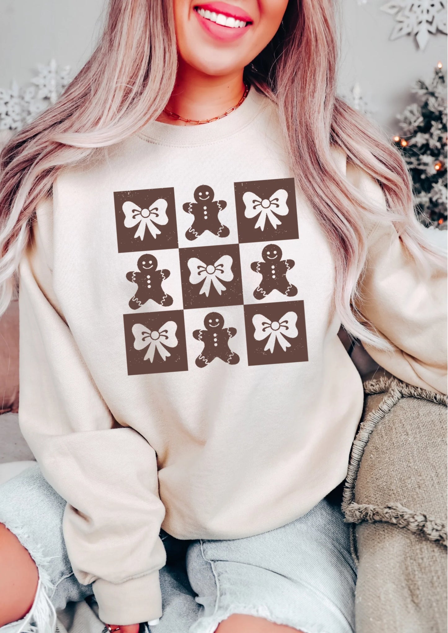 Gingerbread & Bows Brown Christmas Sweatshirt with festive gingerbread and bow design, cozy holiday apparel for winter style, unisex fit, available at LDC Designz.