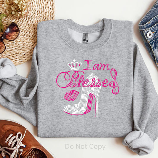 “I Am Blessed Rhinestones Sweatshirt – Christian faith-inspired rhinestone sweatshirt by LDC Designz, sparkly and stylish religious apparel for women and men.”
