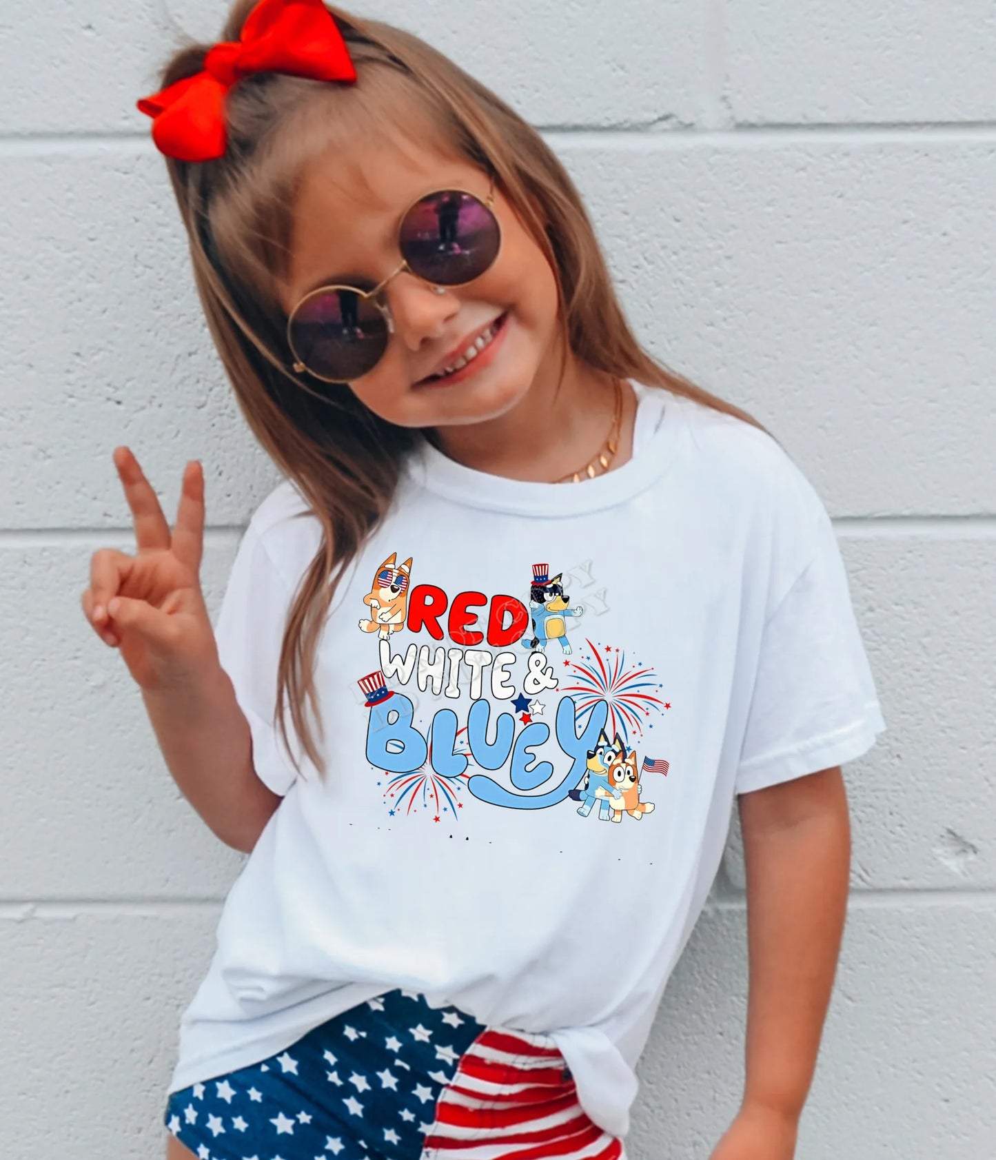 Red, White Bluey toddler t-shirt featuring a patriotic red, white, and blue Bluey design – perfect 4th of July kids' shirt for summer celebrations and holiday outfits.