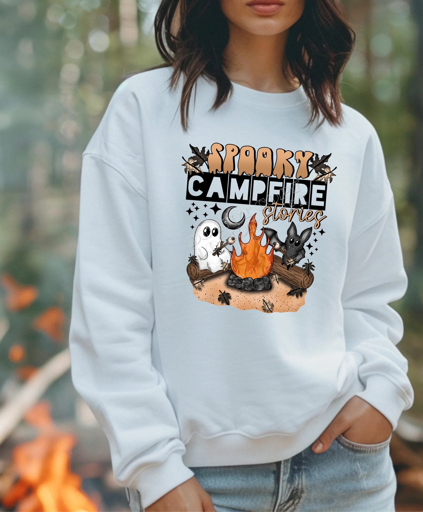 Spooky Campfire Stories Sweatshirt featuring haunted forest design, perfect for Halloween nights, scary story lovers, and cozy fall campfires.