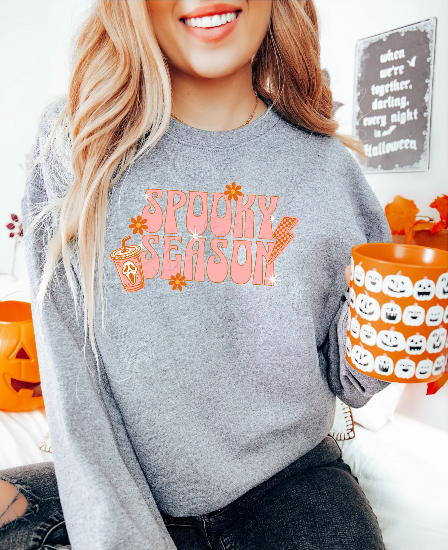 Spooky Season Sweatshirt with bold Halloween-themed graphic, cozy fall sweater perfect for pumpkin patch, trick-or-treating, and Halloween parties.