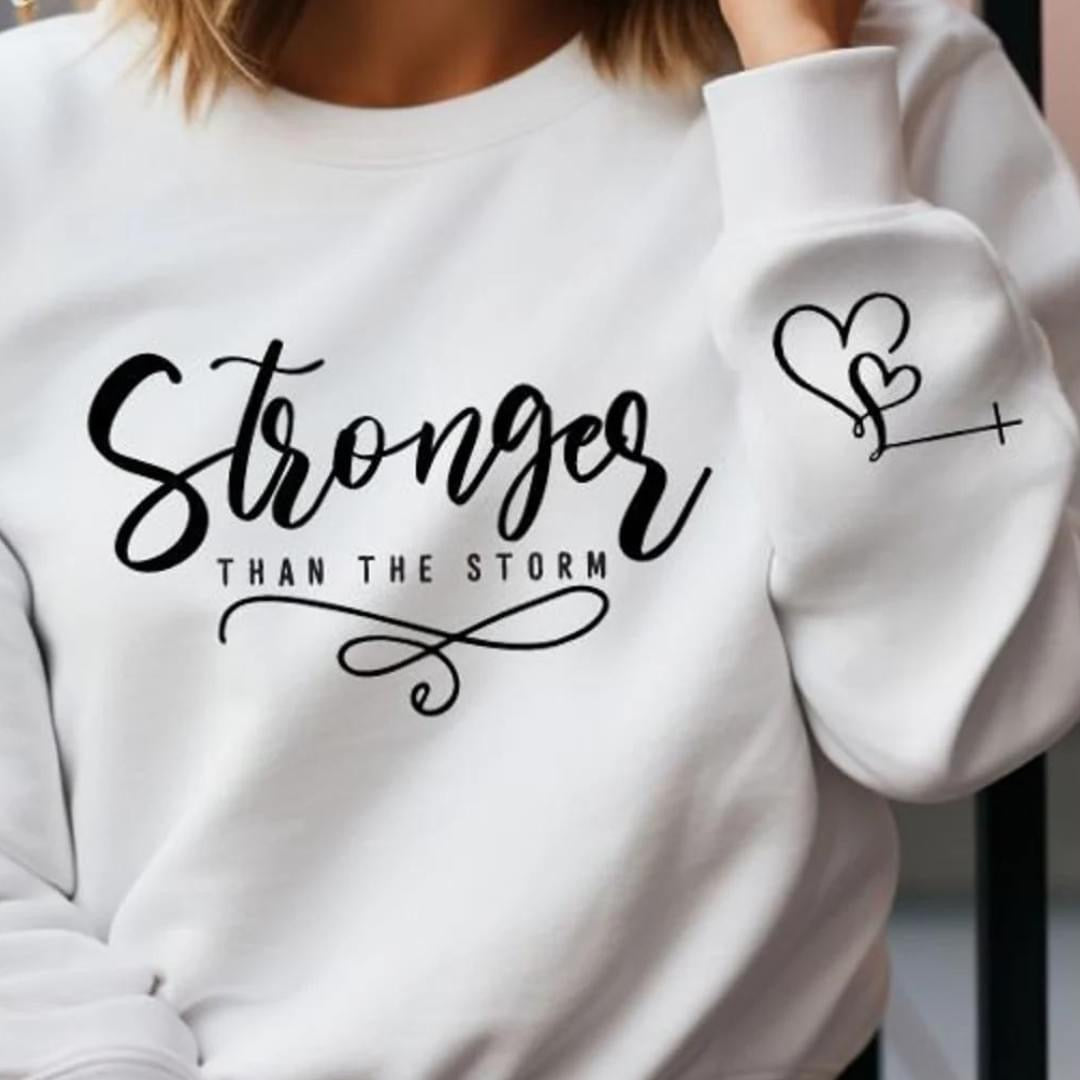 Stronger Than the Storm Sweatshirt – Inspirational Women’s Faith Apparel by LDC Designz, cozy motivational graphic sweatshirt in unisex fit, Cypress Texas.
