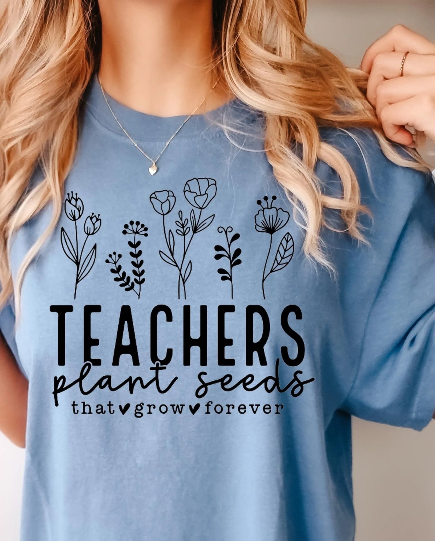 Teacher’s Plant Seeds T-Shirt – Inspirational teacher graphic tee, perfect teacher appreciation gift, motivational unisex shirt for back-to-school or end-of-year teacher presents.