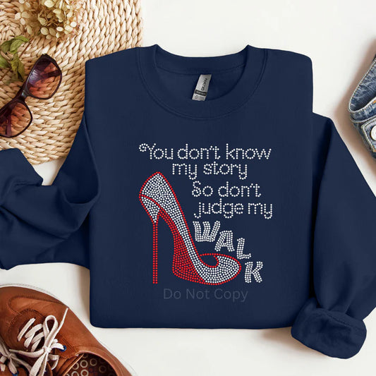 “You Don’t Know My Story So Don’t Judge My Walk (Red Bottom) Rhinestones Sweatshirt – Inspirational Christian rhinestone sweatshirt with sparkling red accents from LDC Designz, faith-based fashion in Cypress, Texas.”