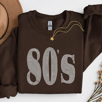 80’s rhinestone sweatshirt featuring sparkling rhinestone lettering on a cozy brown sweatshirt, retro 80s inspired graphic sweatshirt by LDC Designz