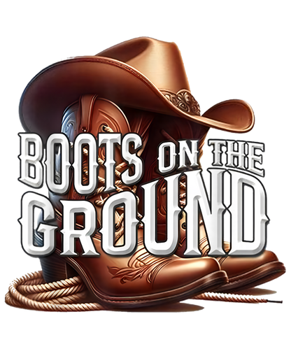 Fringe and sheriff star-inspired “Boots On The Ground” graphic tee with brown boots, cowboy hat, and Western flair.