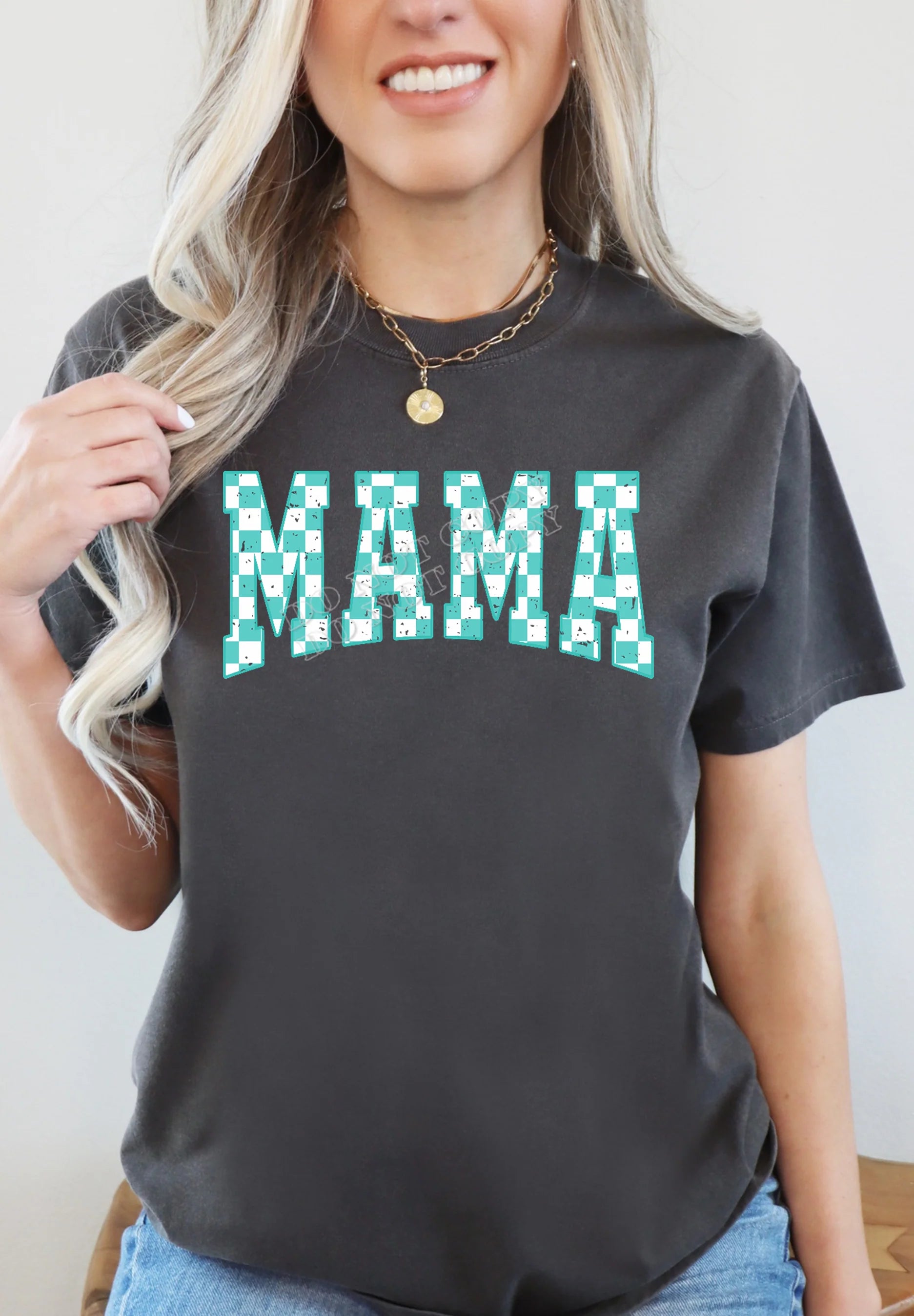 Checkered Mama (Green) T-Shirt – Stylish mom graphic tee with bold green checkered “MAMA” design, casual and comfortable cotton shirt from LDC Designz.