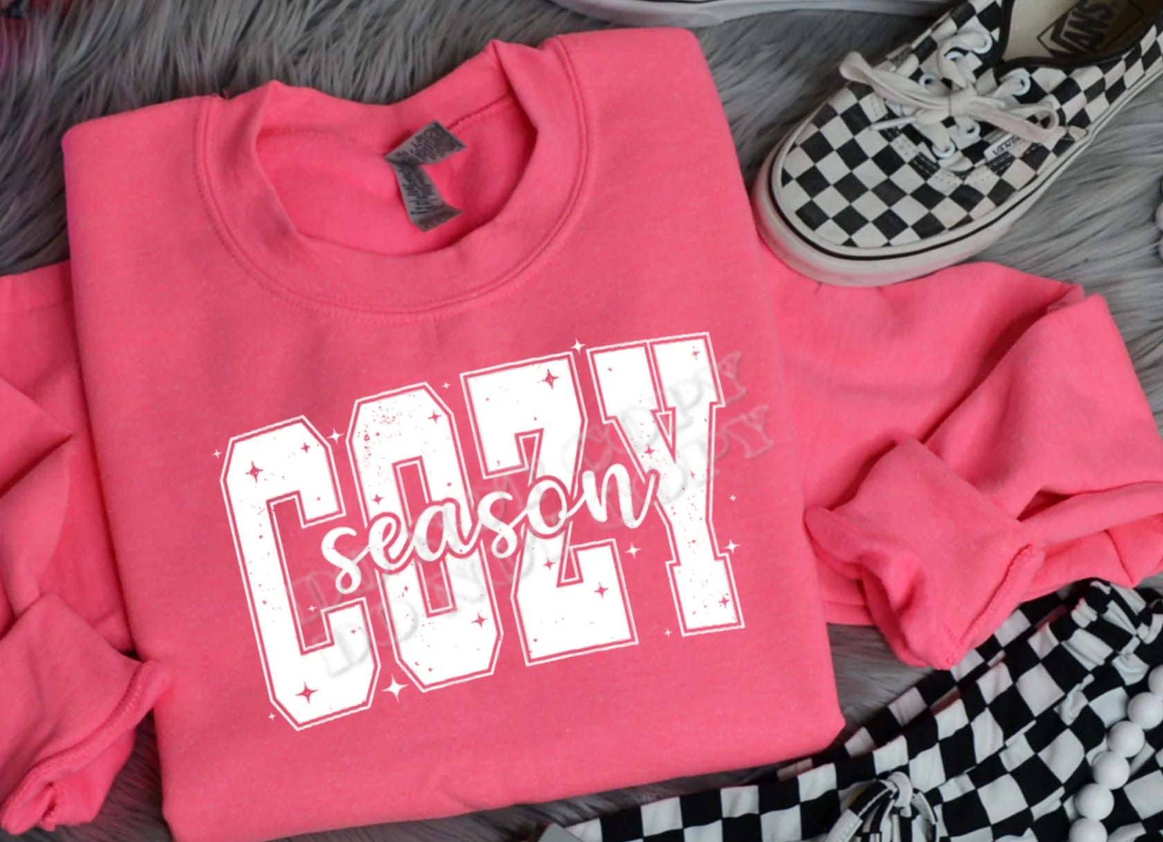 “Cozy Season graphic sweatshirt — soft cotton blend, perfect for fall and winter layering.”

