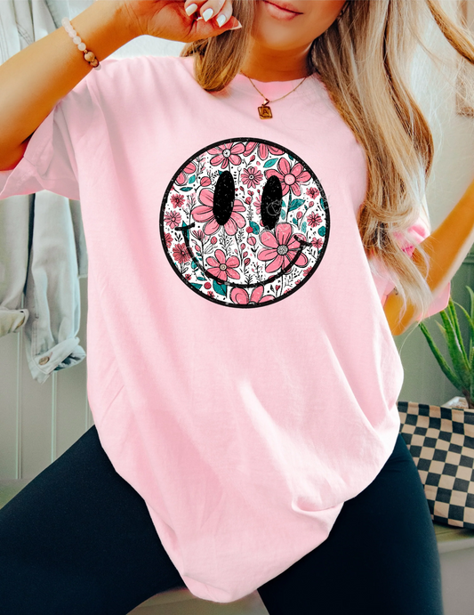 "Floral Colorful Smiley Face T-Shirt – vibrant unisex graphic tee with flowers and smiley design, positive vibes casual shirt from LDC Designz"