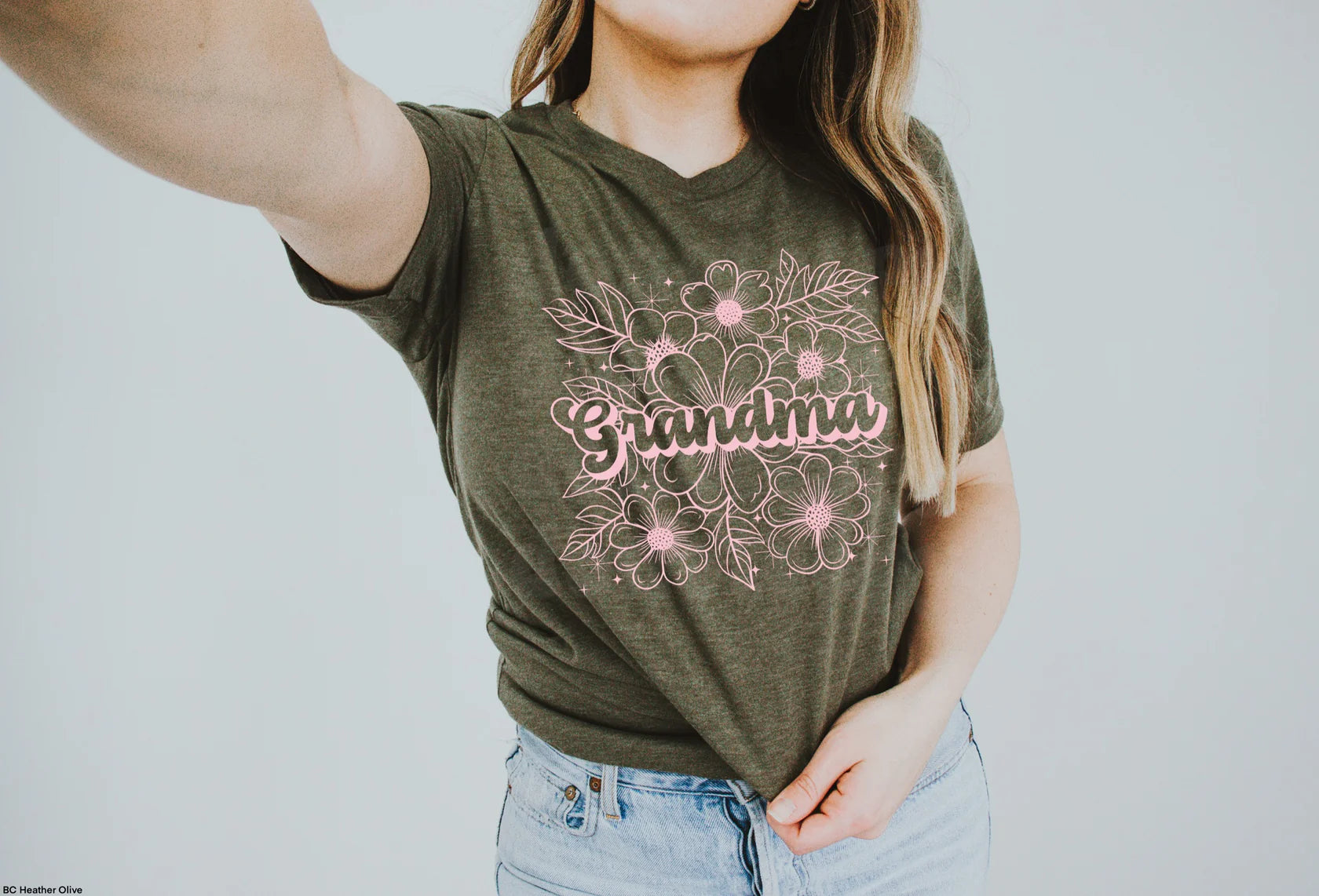Floral Grandma T-Shirt with colorful flower design and bold grandma lettering, soft cotton graphic tee for grandmothers, perfect gift for Mother’s Day and family celebrations