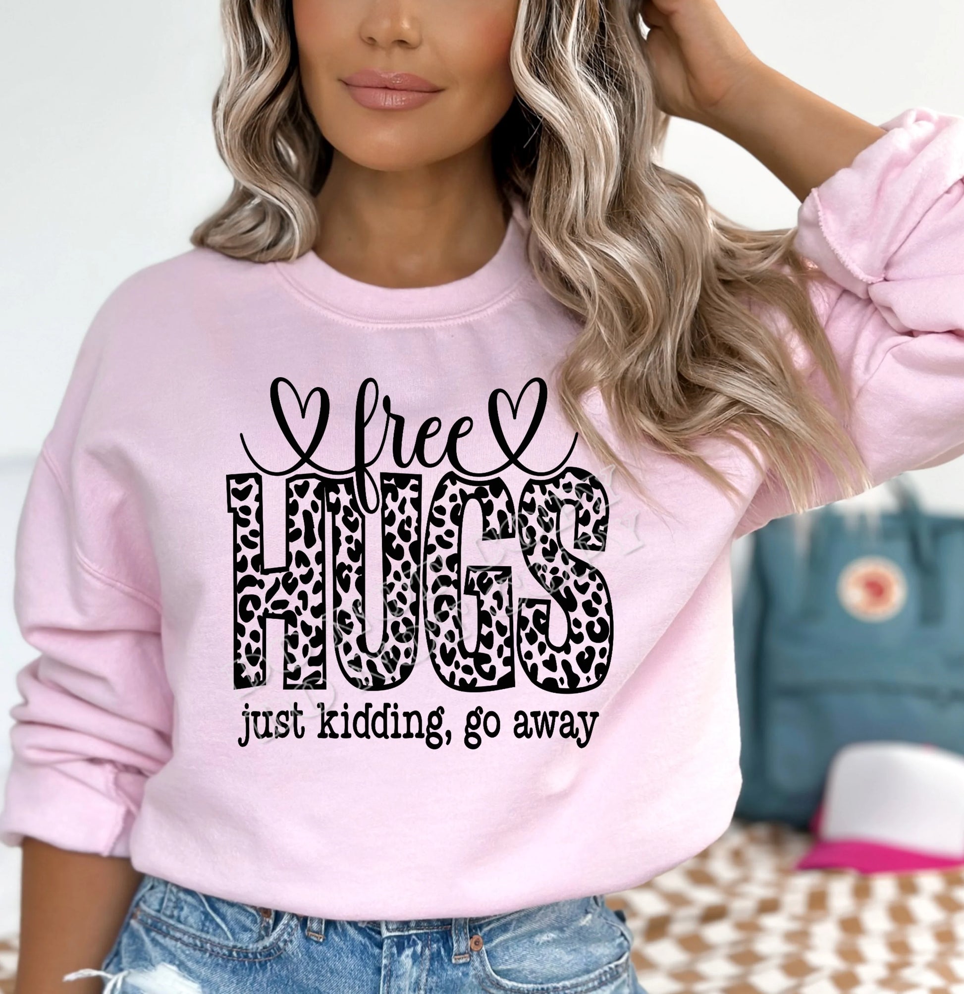 Free Hugs Just Kidding Go Away sweatshirt – funny sarcastic graphic pullover for introverts, cozy unisex sweatshirt from LDC Designz.