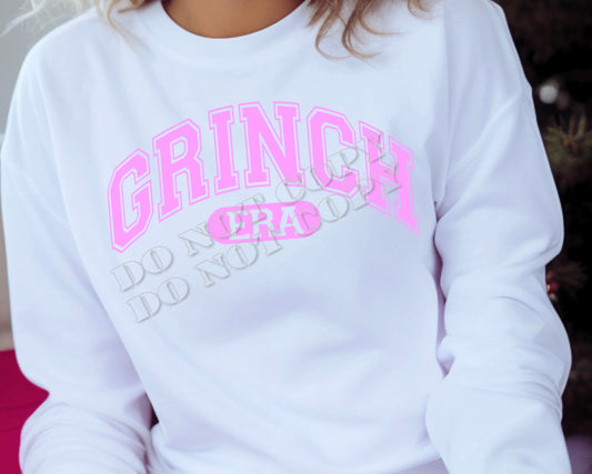 Grinch Era Christmas sweatshirt with bold festive graphic, cozy unisex fleece holiday sweater perfect for winter and Christmas outfits.