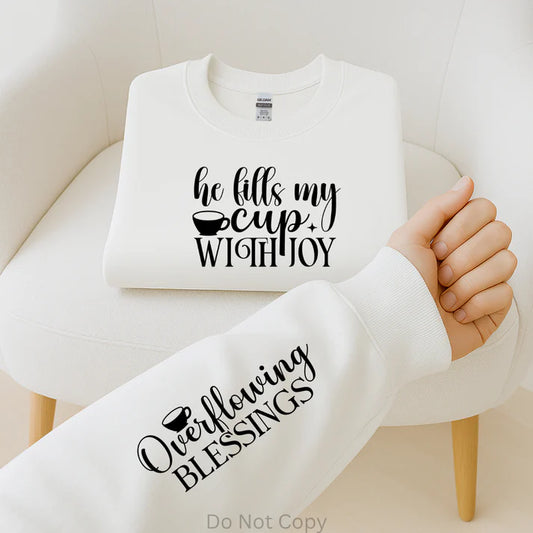 He Fills My Cup with Joy w/ Overflowing Blessings Christian sweatshirt featuring faith-based design and coffee cup graphic from LDC Designz.