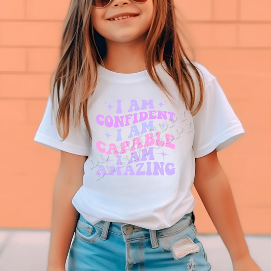 “I Am Confident I Am Capable I Am Amazing” inspirational affirmation T-shirt – positive self-love graphic tee for women and men by LDC Designz, perfect for empowerment events, daily motivation, and confidence-boosting outfits.