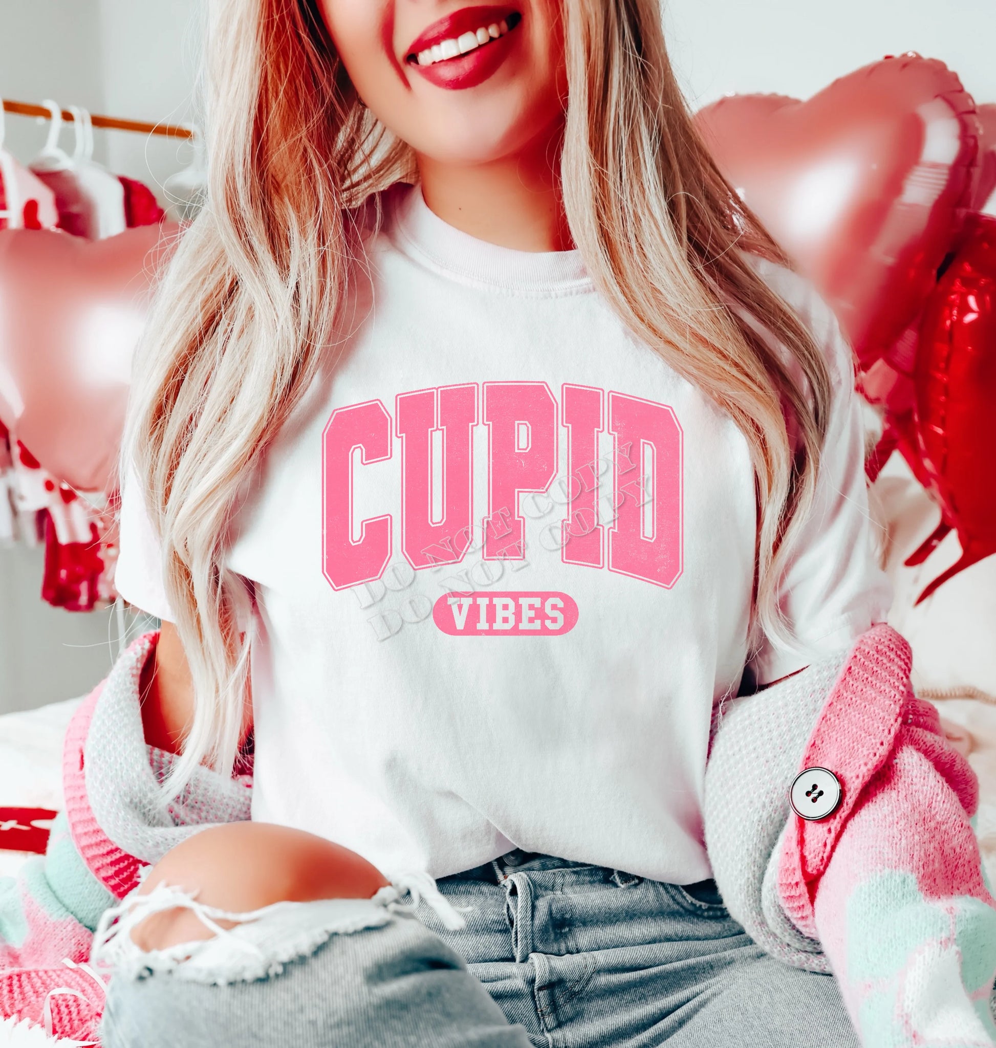 “In Cupid Vibes T-Shirt – soft cotton Valentine’s Day graphic tee with romantic Cupid design, perfect for women’s Valentine outfits, Galentine’s parties, and love-inspired fashion from LDC Designz.”