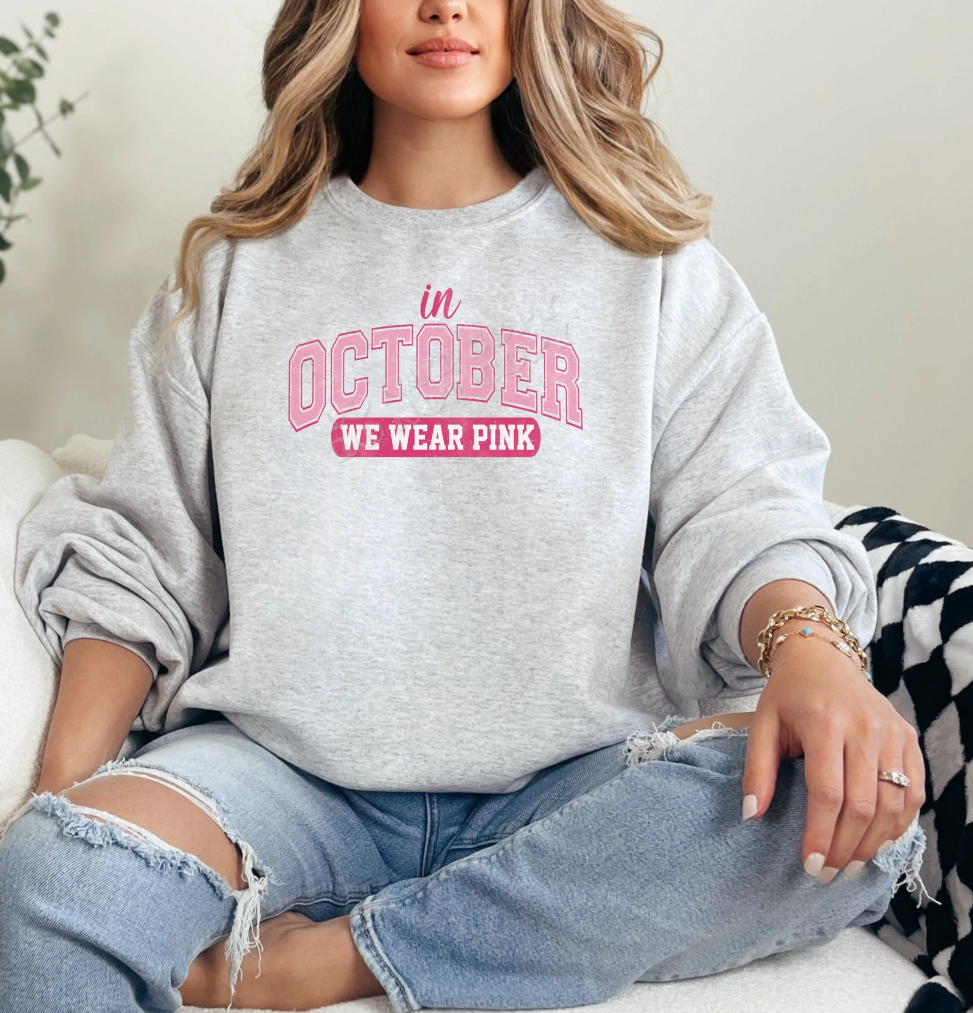 “In October We Wear Pink Sweatshirt – Breast Cancer Awareness pink ribbon crewneck from LDC Designz, soft cozy fall apparel for Pink Out events.”