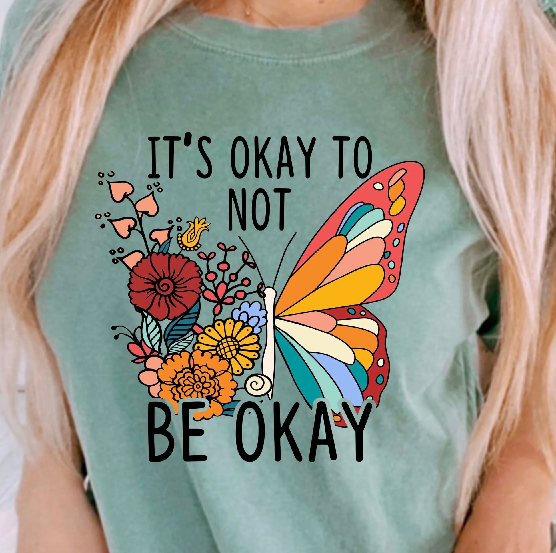 "It's Okay to Not Be Okay" T-shirt – Mental health awareness graphic tee in unisex sizing, featuring positive quote and soft cotton fabric for daily wear.