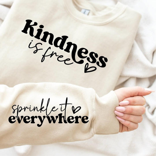 “Kindness is Free Sweatshirt – inspirational unisex graphic sweatshirt from LDC Designz, cozy cotton blend, positive message casual wear, Cypress Texas boutique.”