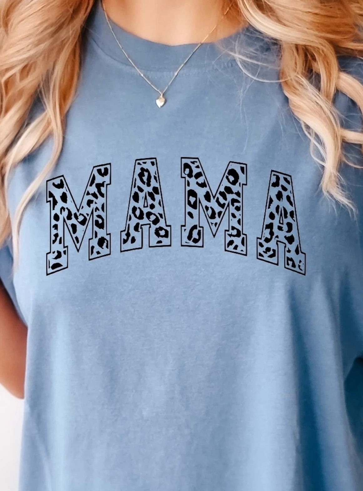 Leopard Mama T-shirt featuring bold leopard print "MAMA" graphic – stylish casual shirt for trendy moms, perfect Mother’s Day gift idea.