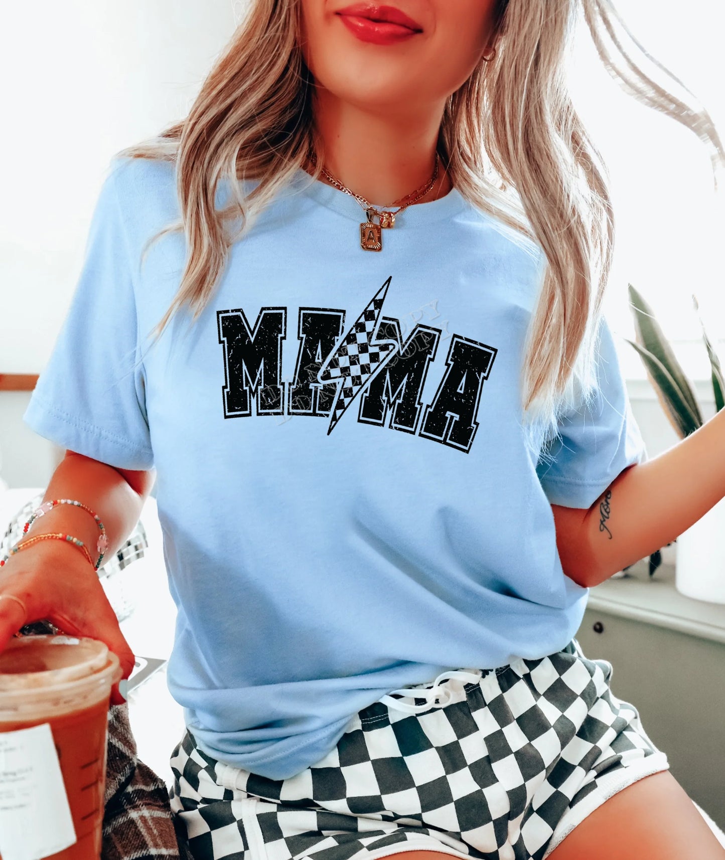 Mama Bolt T-Shirt – trendy graphic tee with bold lightning bolt design, stylish casual shirt for moms, perfect Mother’s Day gift from LDC Designz.