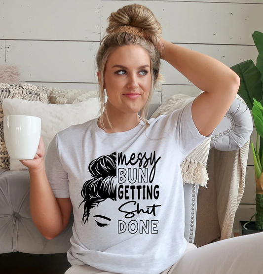 Messy Bun Getting Shit Done T-Shirt – motivational women’s graphic tee for moms, entrepreneurs, and hustlers by LDC Designz. Comfortable cotton shirt with empowering lifestyle design.