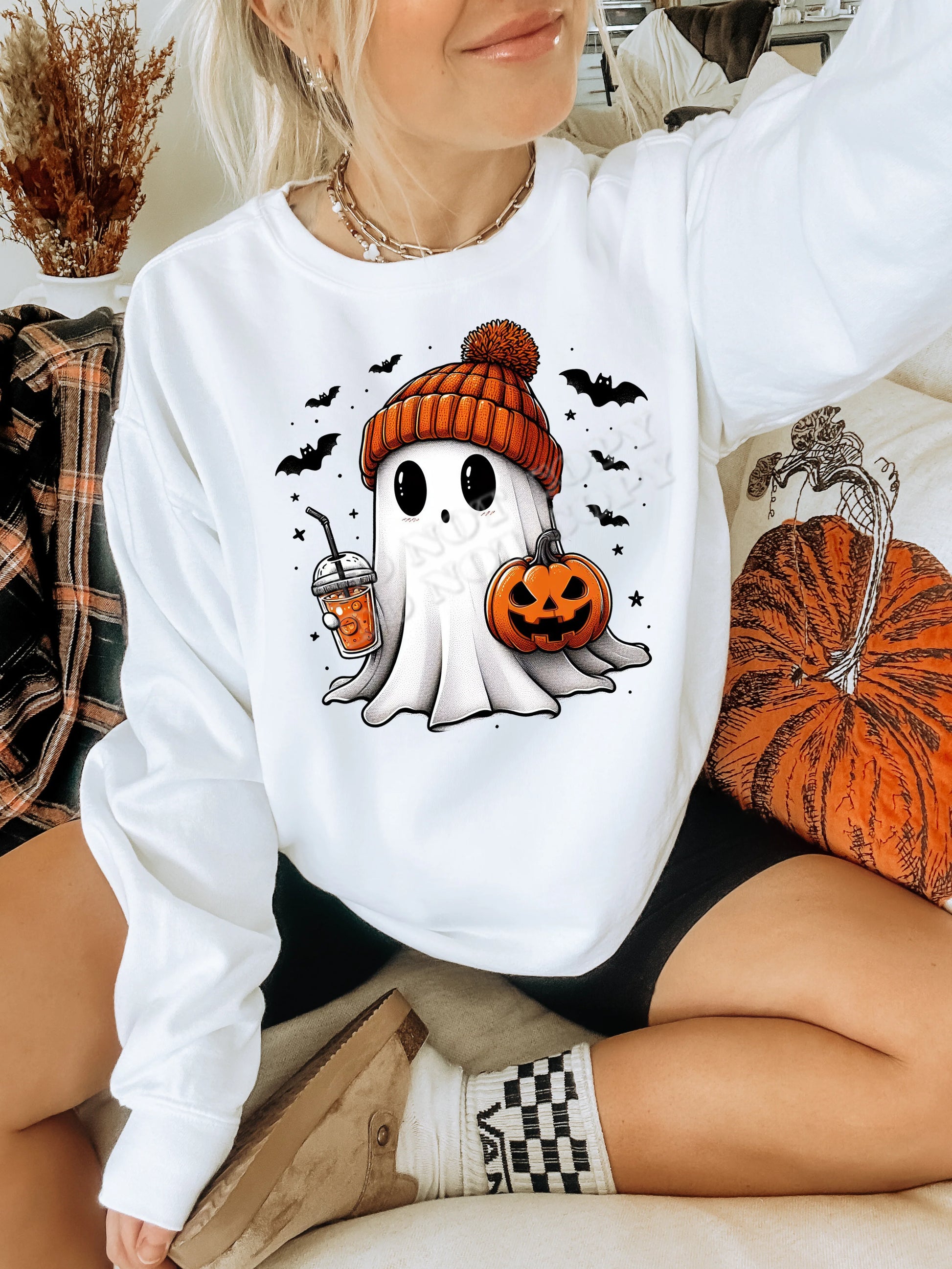 Orange Beanie Ghost Sweatshirt – Cute Halloween ghost design wearing an orange beanie on a cozy fall sweatshirt; perfect for spooky season and autumn fashion lovers.