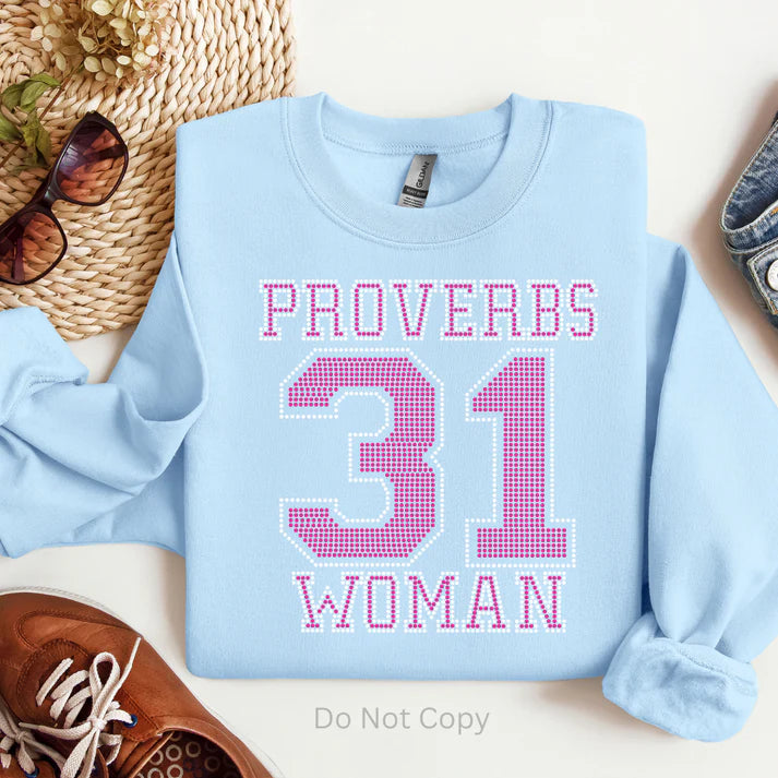 Proverbs 31 Woman Rhinestone Sweatshirt – Christian faith-based sparkle sweatshirt for women by LDC Designz, featuring rhinestone Bible verse design in red, pink, blue, and green colors.
